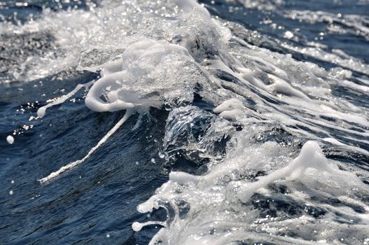 Sea waves abstract nature splashing water background.