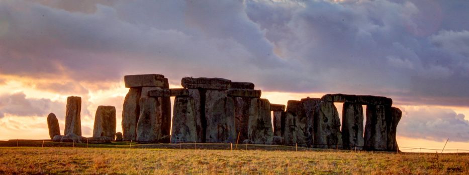 Ancient stoneage monument of stonehenge at sunset in wiltshire