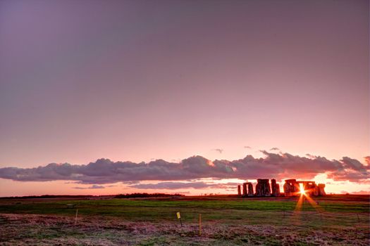 Ancient stoneage monument of stonehenge at sunset in wiltshire