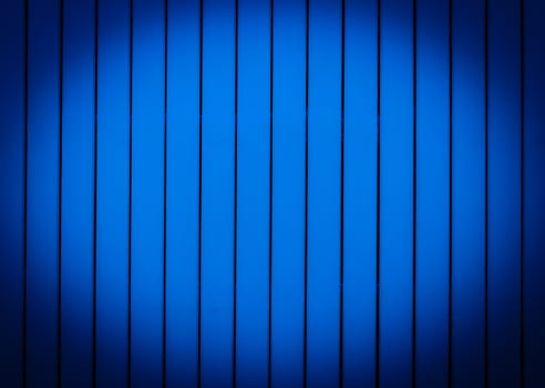 Wood background in vertical pattern,  dark blue color.
