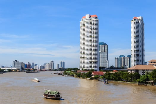 The riverside skyscraper buildings against the skyline in Bangkok, Thailand.