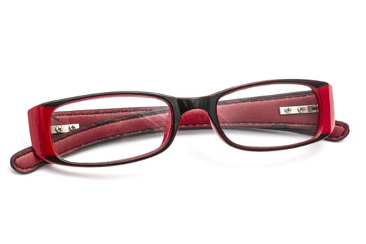 Red glasses isolated on white background 