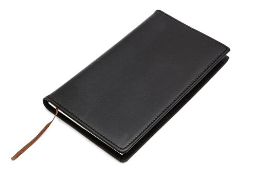 Black notebook isolated on white background