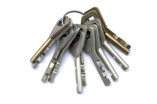 A bunch of old keys isolated on white background 