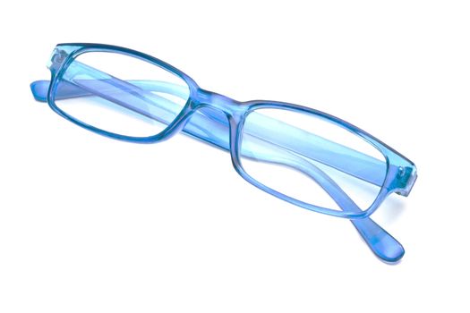 Beautiful blue glasses closeup on white background 
