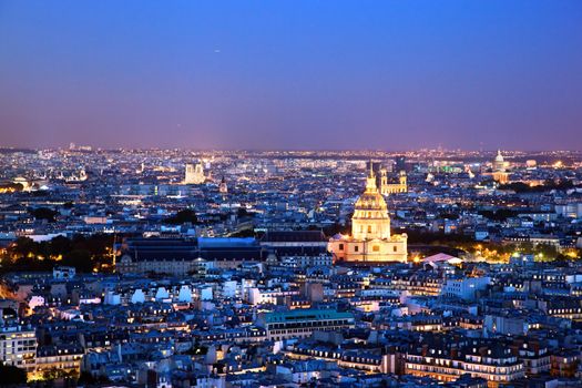 Paris panorama, France at night. View on Les Invalides from Eiffel Tower.
