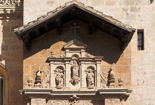 Statues above entrance to the cathedral of Granada, Spain
