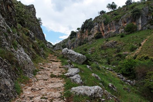 Trail in gorge Mirador de Bailon near Zuheros  on Spain in cloudy day