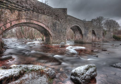 Old brick bridge in Wales at Christmas  