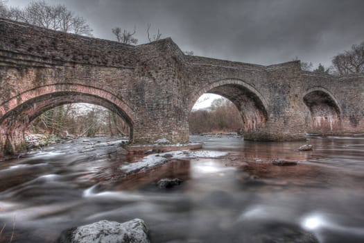 Old brick bridge in Wales at Christmas  