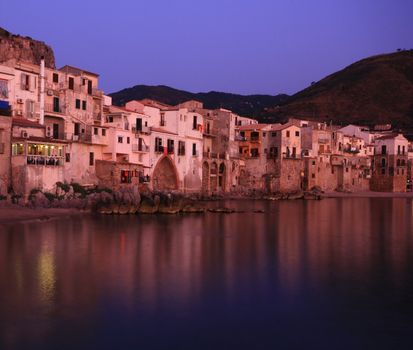 Chefalu  beach at sunset in sicily the largest of Italies islands