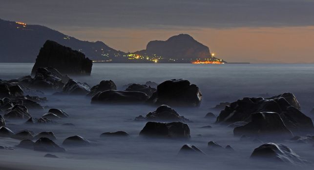 Chefalu  beach at sunset in sicily the largest of Italies islands