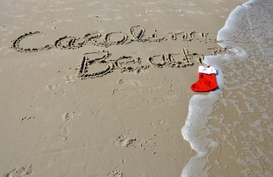 Carolina beach sign with santa hat during the christmas season