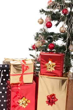 Christmas Tree and Gifts. Over white background.