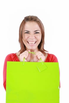 Young woman with shopping bags over white background