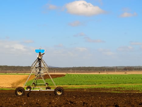 Australian Agriculture Ploughed sugarcane field with irrigation equipment rural landscape scene