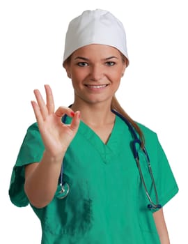 Young woman doctor giving allright sign, isolated against a white background