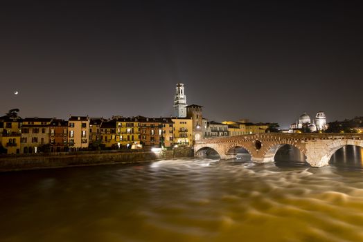 Ponte Pietra the oldest monument in Verona - Italy, and the river Adige