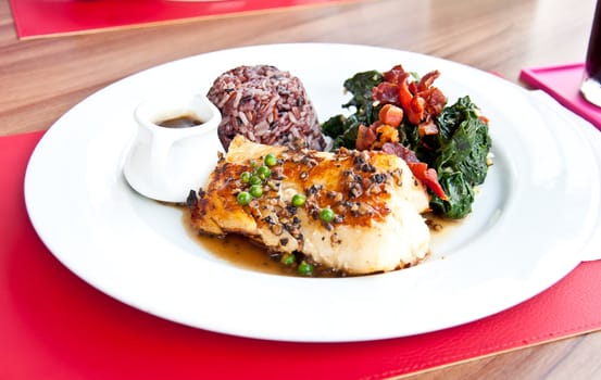 salmon fish pepper steak with germinated brown rice and spinach for healthy food