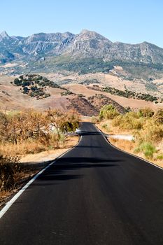 asphalt road to  mountains in Andalucia, Spain