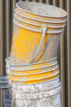 Cement Worker Bucket on the Construction Site