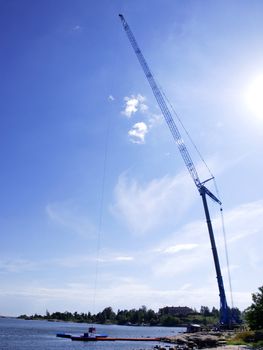 Bungy jump crane, towards beautiful blue sky
