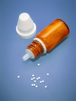 An image of a homeopathic medicine bottle with tablets