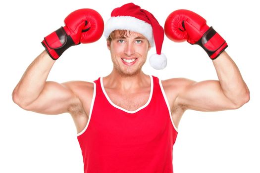 Christmas fitness boxer wearing santa hat smiling happy. Funny portrait of fit exercise model isolated on white background.