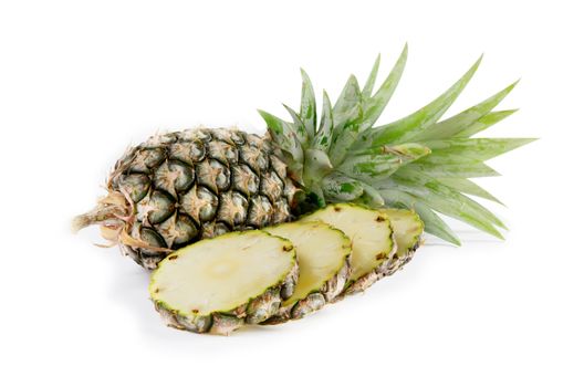 raw  pineapple and  sliced  pineapple  on white 