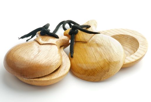 Simple Wooden Castanets isolated on white background