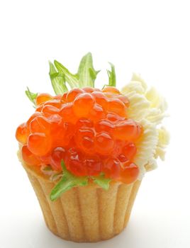 Tartlet with Perfect Red Caviar, Butter and Greens closeup on white background