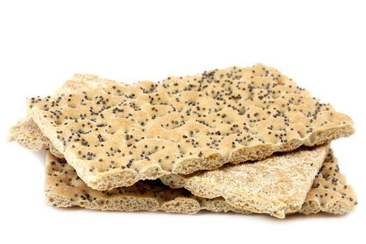 Crisp bread with poppy seeds on white 