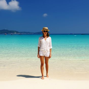 Woman in hat at beach