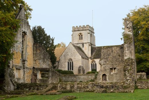 Church of Minster Lovell in Cotswold village with graveyard