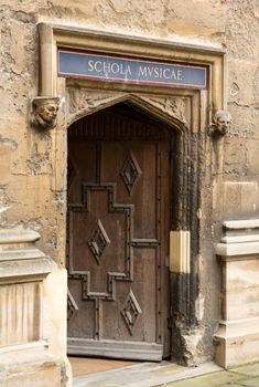 Carved wooden door at entrance to School of Music at Bodeian Library University of Oxford