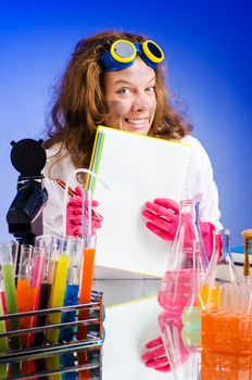 Funny female chemist in lab