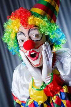 Funny clown in studio shooting