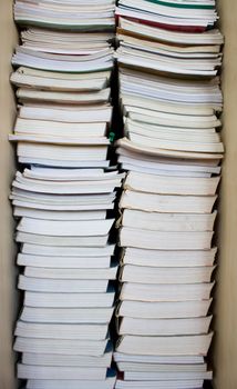 High stack of used books in a library 