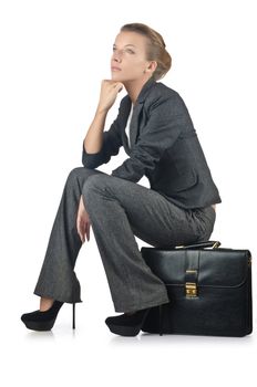 Businesswoman with briefcase on white