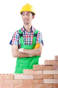 Builder with hard hat on white