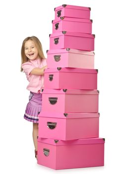 Little cute girl with lots of boxes