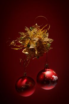 red christmas balls on dark red background