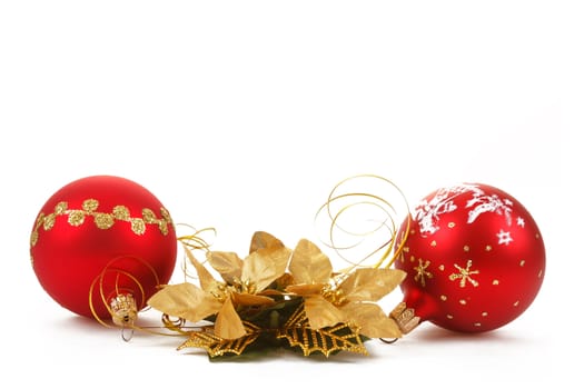 Red christmas balls with decorations on white