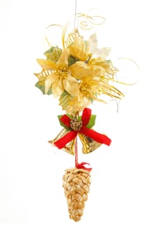 christmas decoration with cone , bells and golden flower on white background