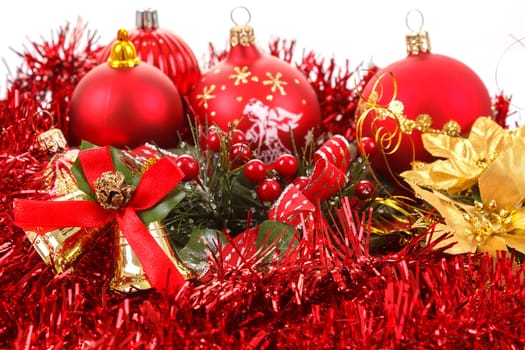 Red christmas balls and decorations on white background