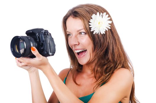 Attractive female photographer on white