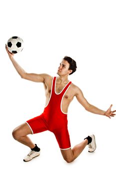 Young and handsome man with a soccer ball gymnast