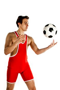 Young and handsome man with a soccer ball gymnast