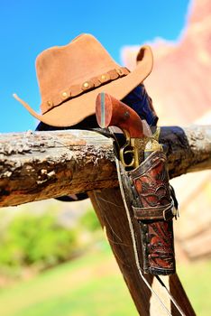 hat and gun in the far west, western spirit