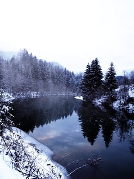 Winter scene with a river